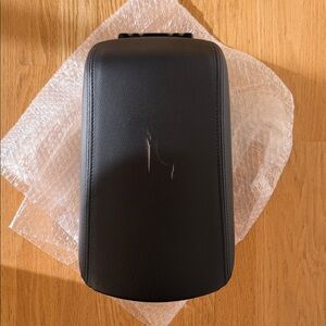 Black center console lid assembly for 2011-2019 Ford Explorer models